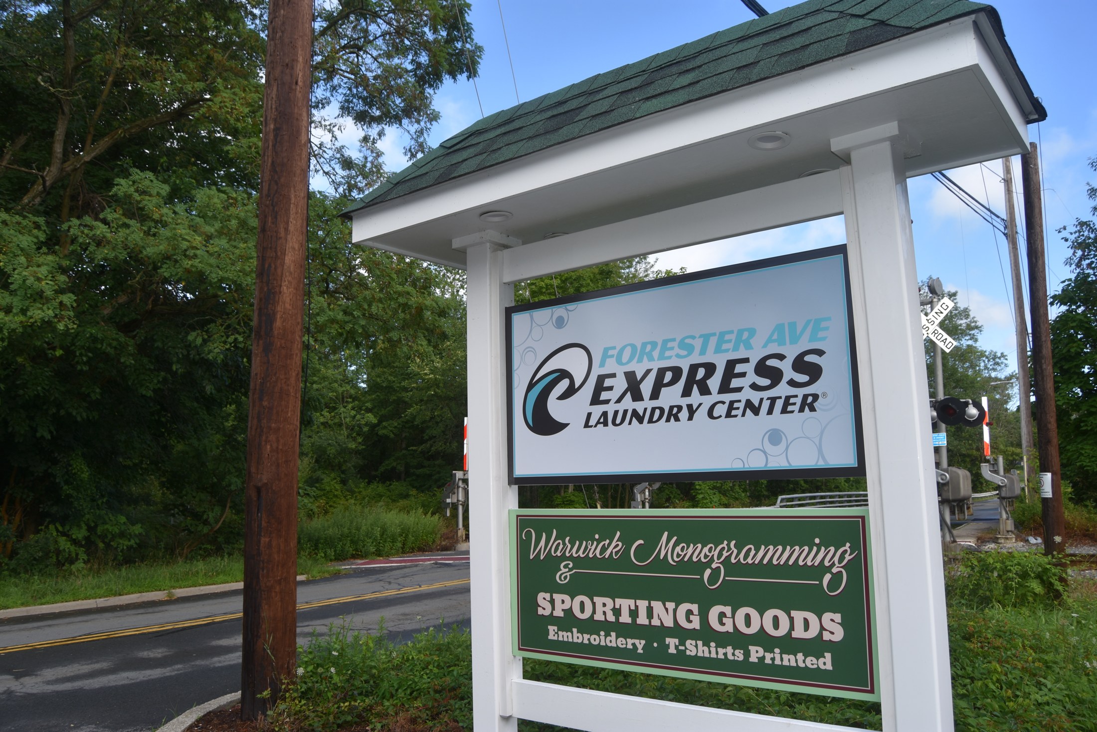 The Express Laundry Center roadside sign on Forester Avenue