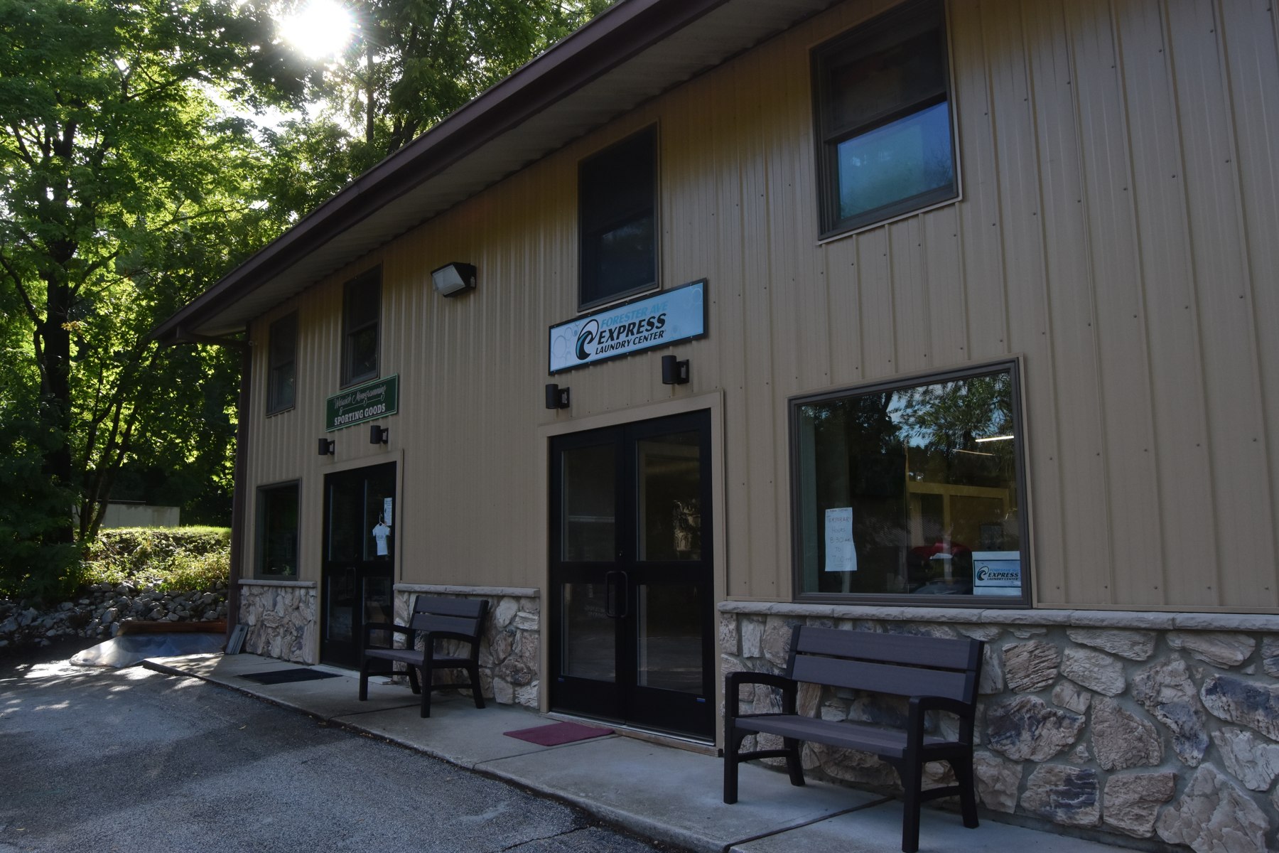 Express Laundry Center entrance and benches